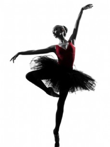 双脚尖点地的芭蕾舞演员摄影图片