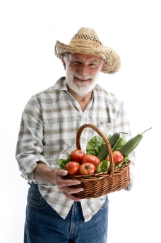 捧着一筐西红柿的农夫图片